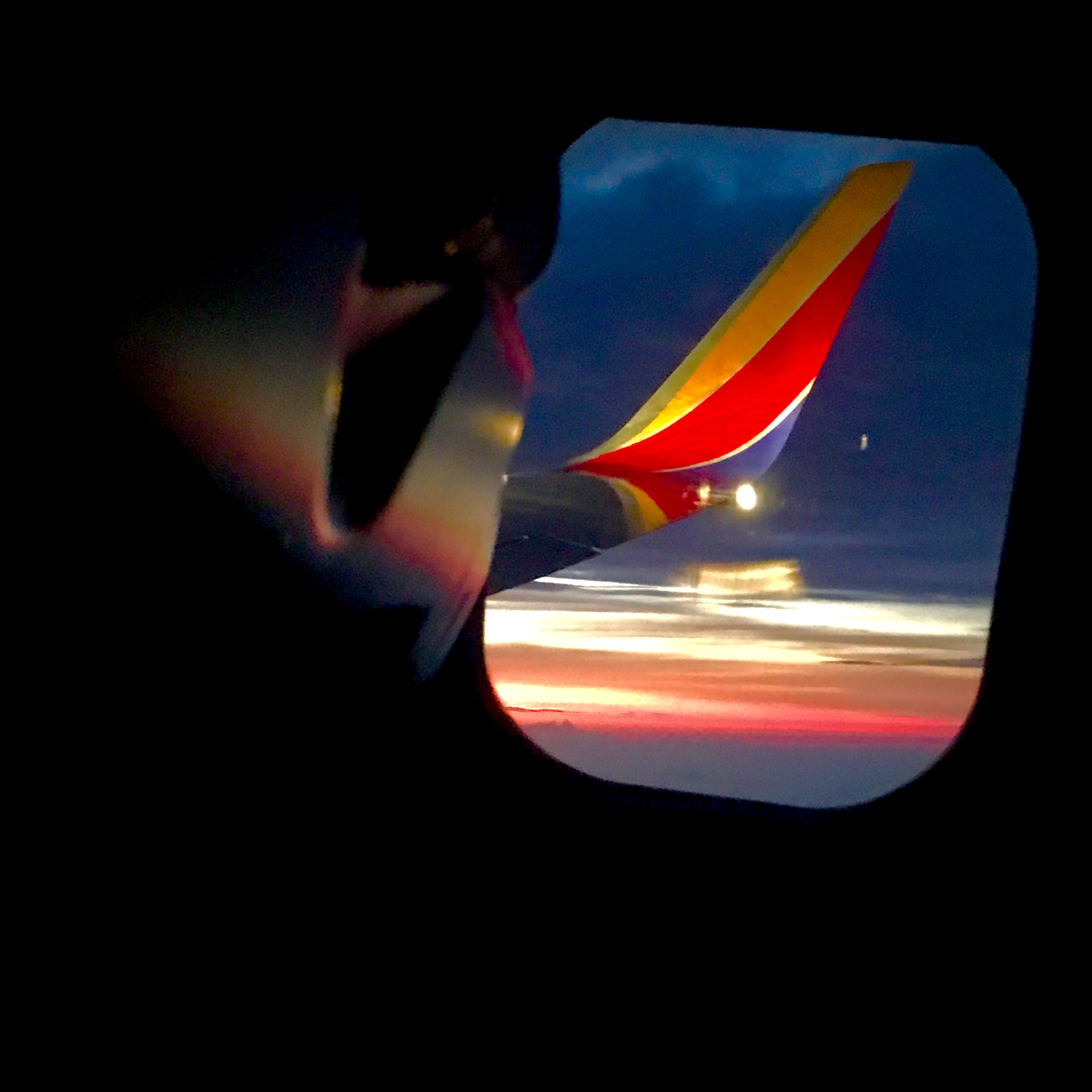 Airplane WIndow Sunrise  © jj raia